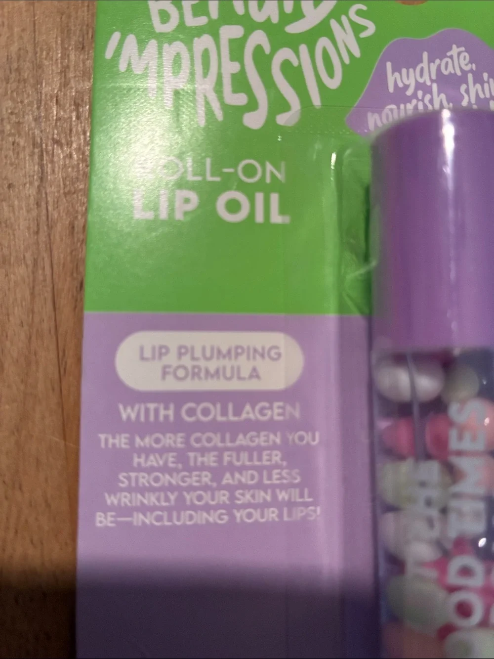 Impressions Roll-On Lip Oil Duo in Pink and Purple Packaging